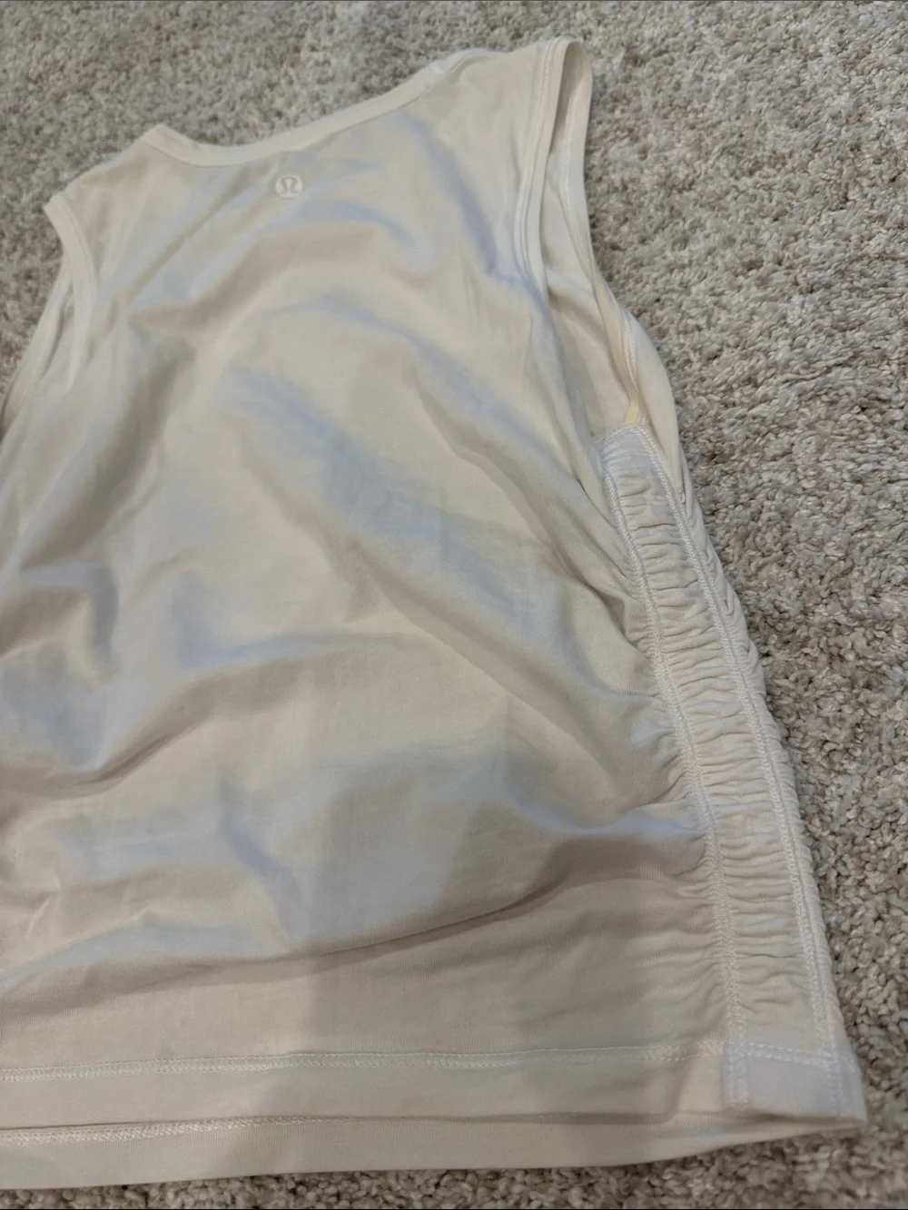 Lululemon white cinch side tank size 2. Great condition.